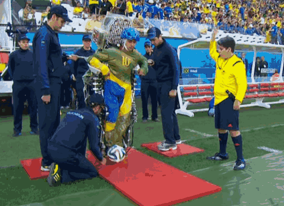 Paraplegic controls exoskeleton with mind, kicks off World Cup