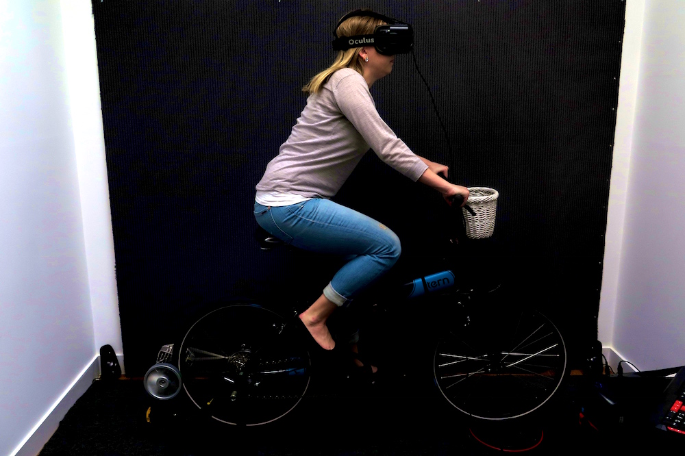 VR headset + bike sensors gamify fitness