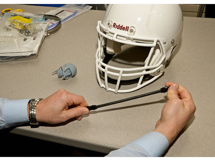 Smart helmet + rate activated strap could minimize head injury severity